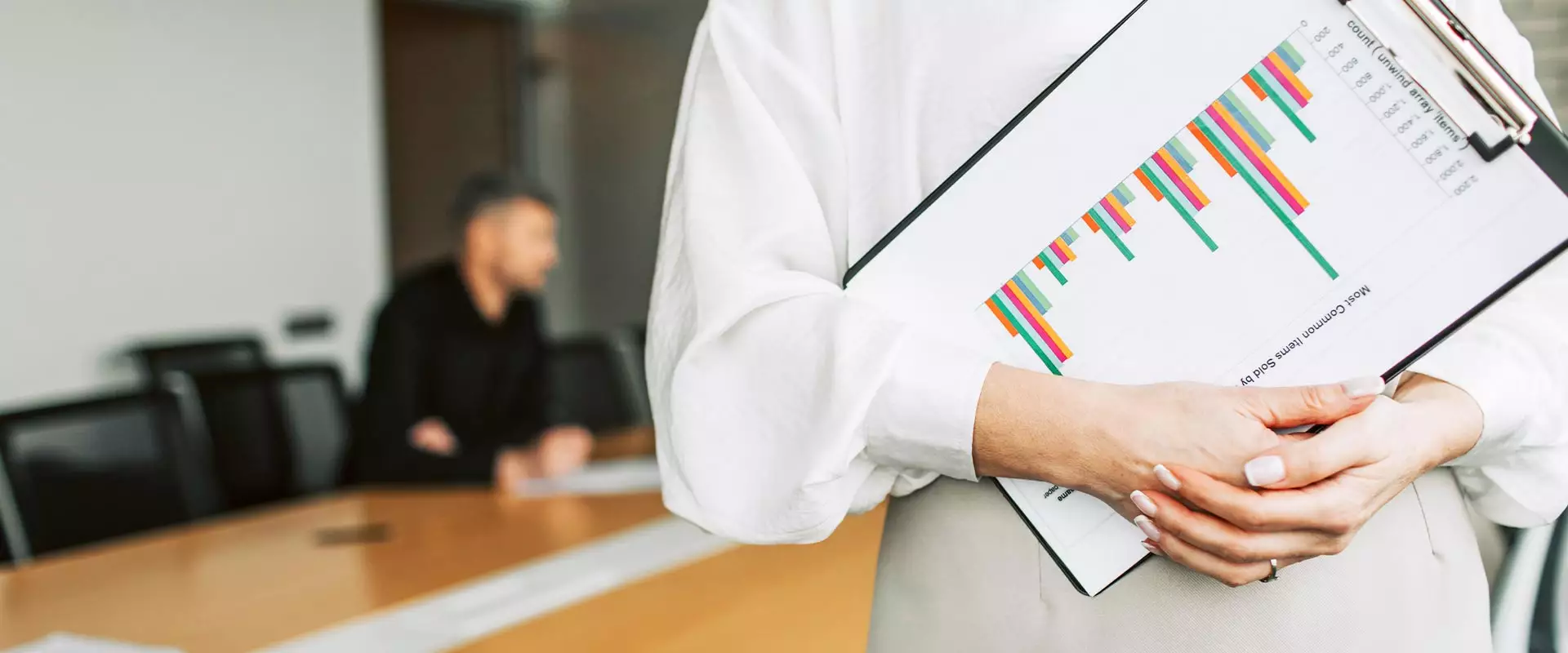 Woman holding Clipboard with Chart